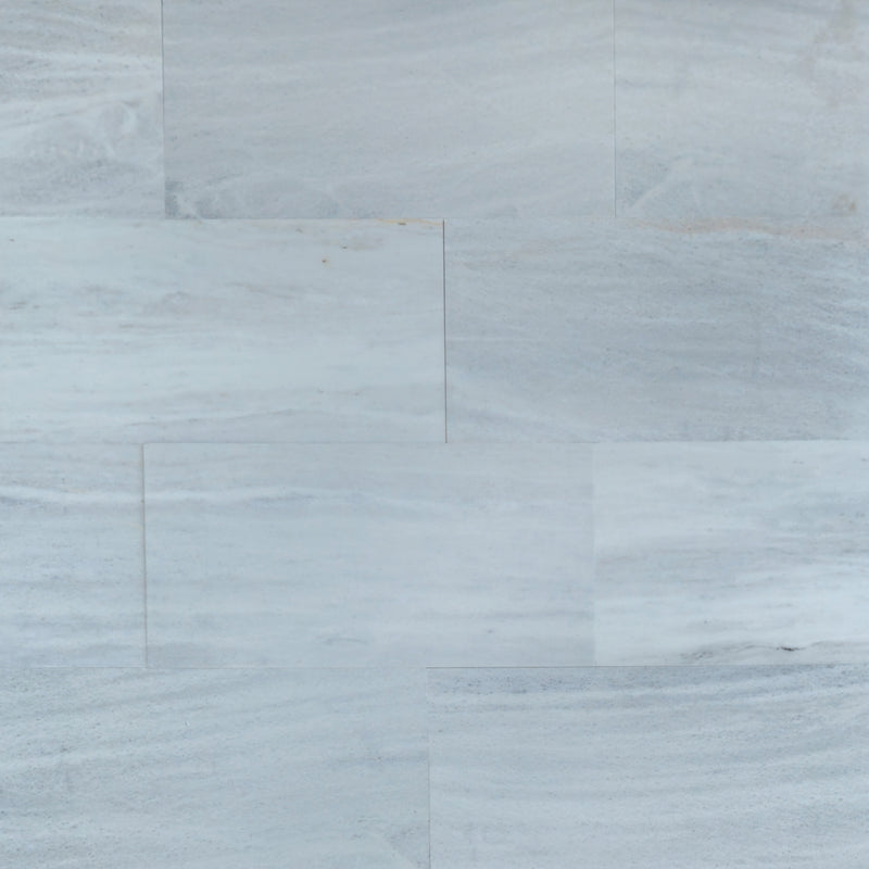 solto white stone marble polished 12x24 13 tiles closeup view