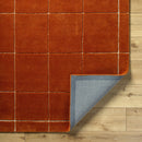 Siarl Burnt Orange Checkered Area Rug
