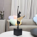 Stylized black and gold guitarist resin figure – living room decor