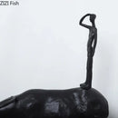 Stylized black matte metal cowherd shepherd boy sculpture living room