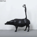 Stylized black matte metal cowherd shepherd boy sculpture living room