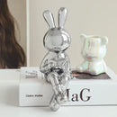 Stylized gold ceramic rabbit sculpture set living room decor