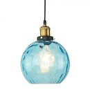 Textured blue glass ball pendant light for dining room