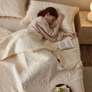 Textured cream cotton quilted bedspread set for bedroom with fringes