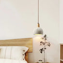 Textured gray cement and wood pendant lamp for dining room
