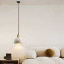 Textured gray cement and wood pendant lamp for dining room