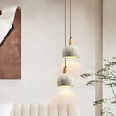 Textured gray cement and wood pendant lamp for dining room