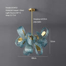 Textured turquoise blue glass luxury wall sconce pair for bedroom