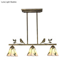 Tiffany brass leaf island lighting fixture – kitchen bird pendant