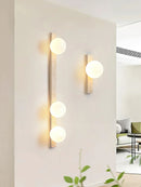 Vertical Travertine Ball Wall Sconce