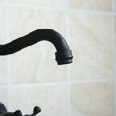 Vintage black swivel wall mounted bathroom faucet with ceramic base