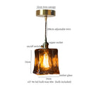 Vintage brass amber glass pendant light for kitchen island
