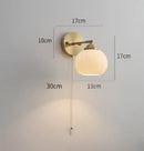 Vintage brass ceramic wall lamp with ribbed glass shade for bedroom