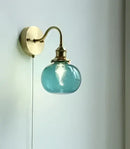 Vintage brass ceramic wall lamp with ribbed glass shade for bedroom