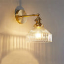 Vintage brass wall lamp with ribbed glass shade for living room