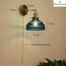 Vintage brass wall lamp with ribbed glass shade for living room