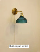 Vintage brass wall lamp with ribbed glass shade for living room
