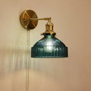 Vintage brass wall lamp with ribbed glass shade for living room
