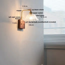 Vintage brass wall light with etched clear glass bedroom sconce