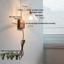 Vintage brass wall light with etched clear glass bedroom sconce