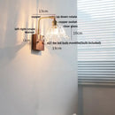 Vintage brass wall light with etched clear glass bedroom sconce