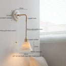 Vintage ceramic wall sconce with copper arm – bedroom pull chain lamp