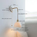 Vintage ceramic wall sconce with copper arm – bedroom pull chain lamp