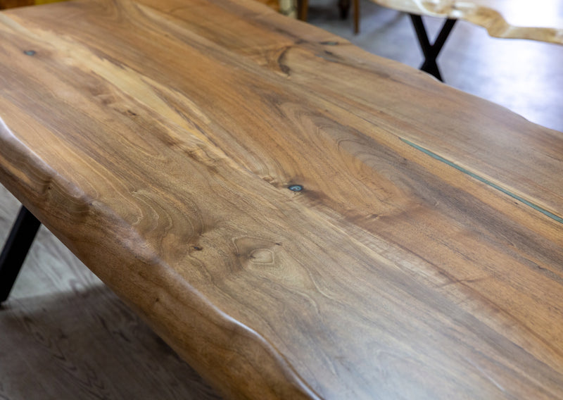 walnut living edge dining table 37x84x29.5 thick Natural finish epoxy filled angle profile closeup view