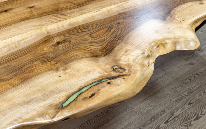 walnut living edge dining table 40x100x29.5 Natural finish epoxy filled angle closeup view