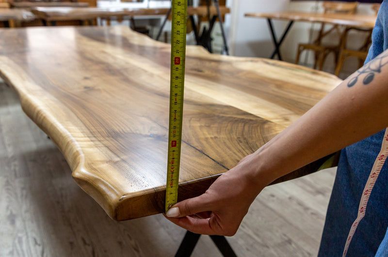walnut living edge dining table 40x100x29.5 Natural finish epoxy filled thickness measure view