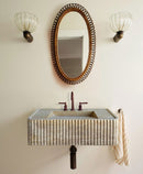 Walnut Travertine Rectangular Wall-mount Bathroom Sink Fluted (W)16" (L)32" (H)10" bathroom bronze color drain pipe and faucet along with sconces and mirror wide view