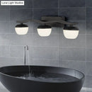 Wave design black metal wall lighting with frosted glass for bedroom
