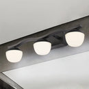 Wave design black metal wall lighting with frosted glass for bedroom