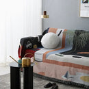 Whimsical space themed black knit sofa blanket living room decor