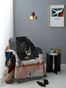 Whimsical space themed black knit sofa blanket living room decor