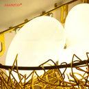 White and gold ceramic birds nest wall lamp for children room