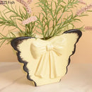 White butterfly ceramic vase with pink bow living room decor