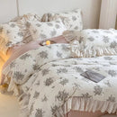 White floral cotton bedding set with lace ruffles for bedroom