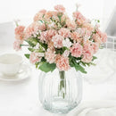 White hydrangea bouquet in ribbed glass vase for living room decor