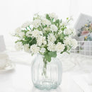 White hydrangea bouquet in ribbed glass vase for living room decor