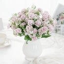 White hydrangea bouquet in ribbed glass vase for living room decor