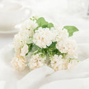 White hydrangea bouquet in ribbed glass vase for living room decor