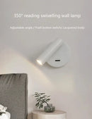 White lacquered swivelling bedroom wall lamp with push button switch