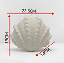 White ridged ceramic clam shell vase living room decor