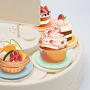 White two tiered rotating dessert table sushi machine dining room