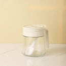 Yellow flip top glass seasoning jar with spoon kitchen spice shaker
