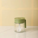 Yellow flip top glass seasoning jar with spoon kitchen spice shaker
