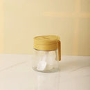 Yellow flip top glass seasoning jar with spoon kitchen spice shaker