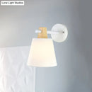 Yellow macaron fabric wall light with wood accent bedroom sconce