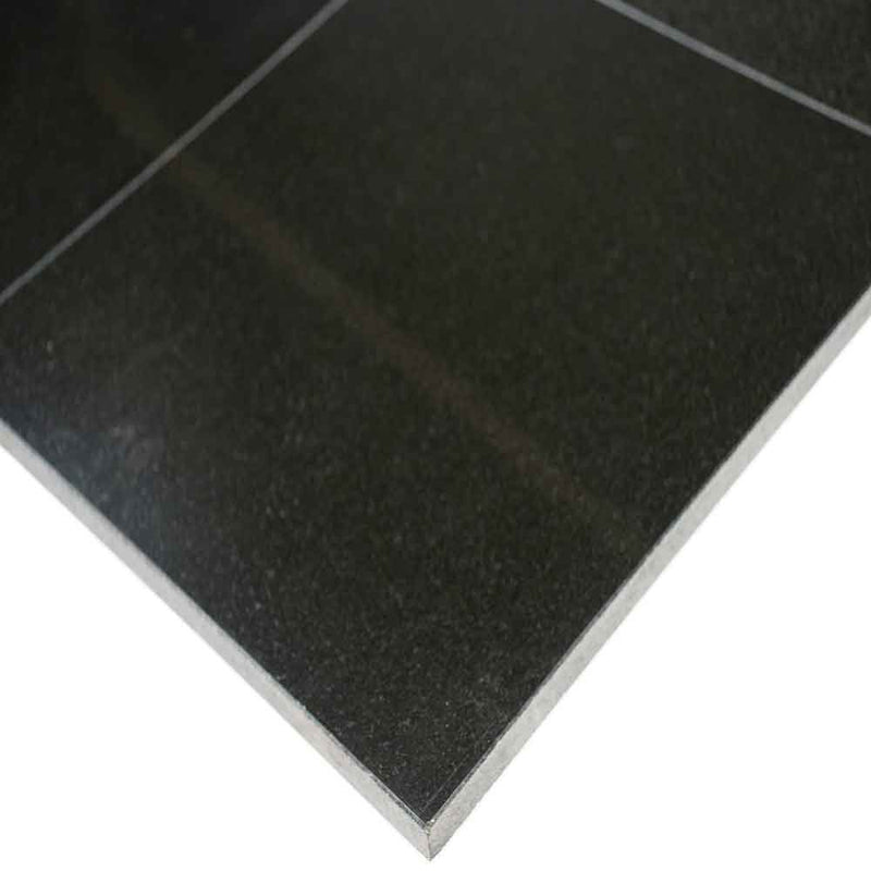 Absolute black 12 in x 12 in polished granite floor and wall tile TINDBLK1212 product shot profile view